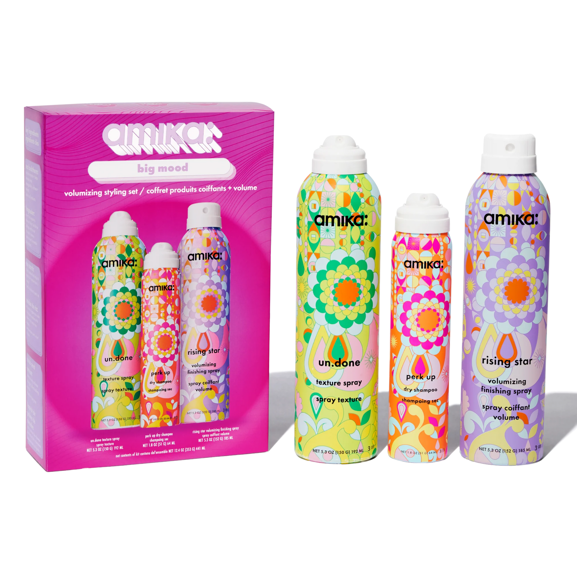 Amika hair product set with colorful packaging on a white background