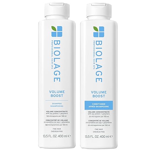 Two bottles of Biolage Volume Boost shampoo and conditioner on a white background