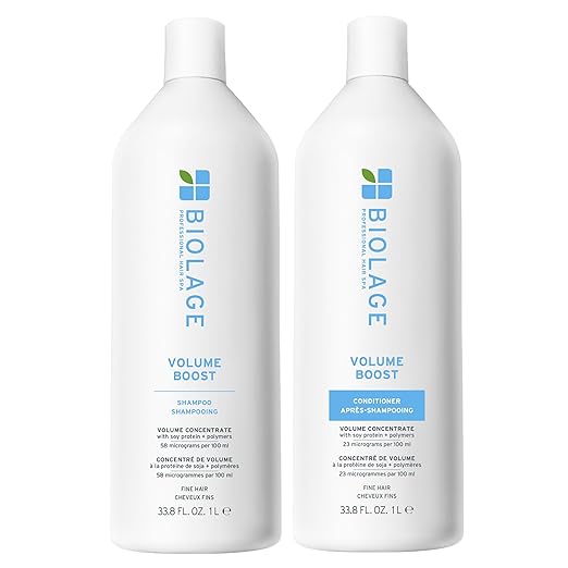 Two bottles of Biolage Volume Boost shampoo and conditioner on a white background