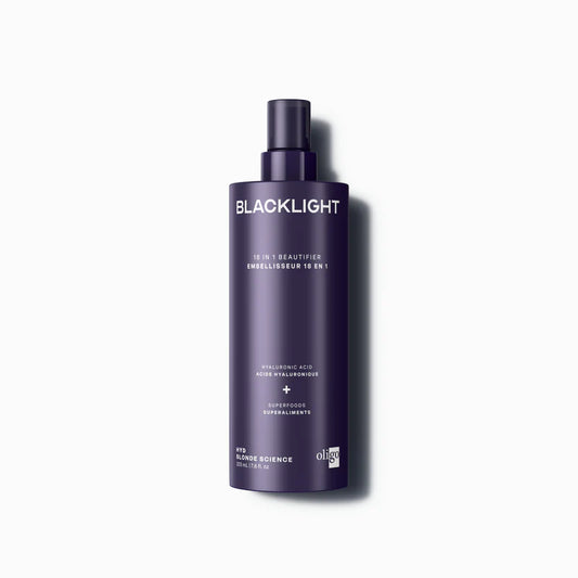 Purple bottle labeled 'Blacklight' 18 in 1 beautifier  on a white background