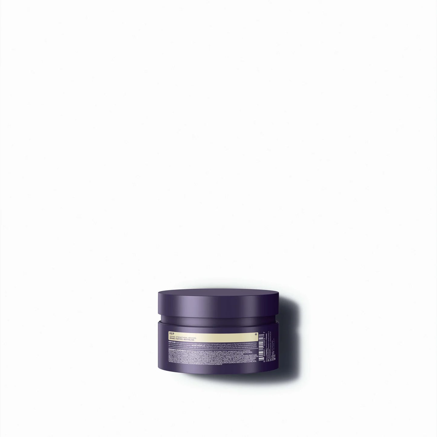 Purple jar Blacklight repair mask ingredients list with a white label on a white background