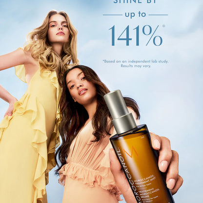 Two women with styled hair holding a bottle of Max Factor hair product against a blue sky background.