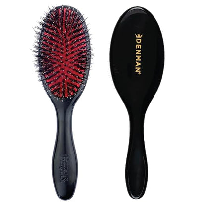 Two black hairbrushes shown side by side on a white background, one displaying the red and black bristles and the other showing the back with gold DENMAN branding.