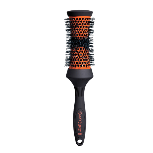 Hairbrush with black and orange bristle design on a white background