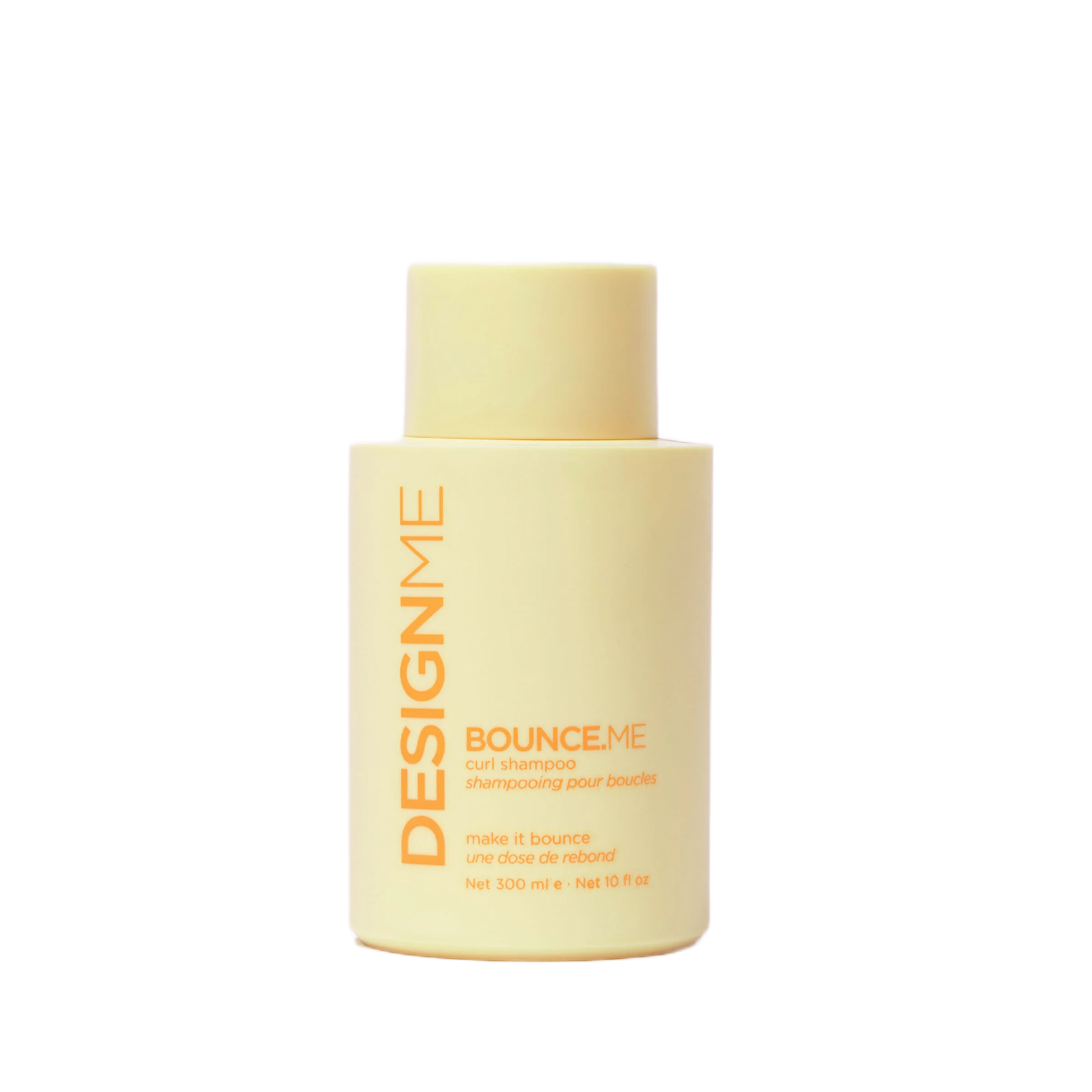 Yellow bottle of DesignMe hair product on a white background