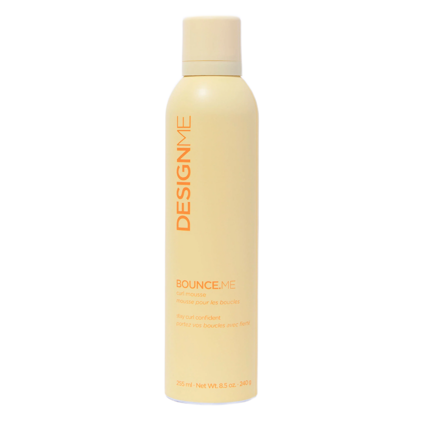 Yellow bottle of Design.Me hair product on a white background