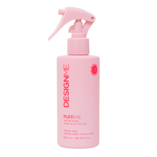 Pink spray bottle with 'Design Me' branding on a white background