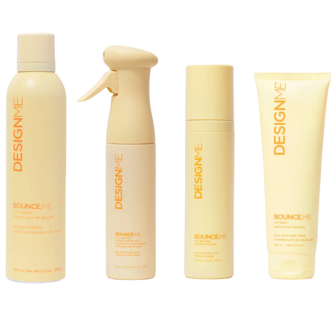 Four Designe Bounce+E haircare bottles and tubes in a pale yellow set, arranged on a plain white background.