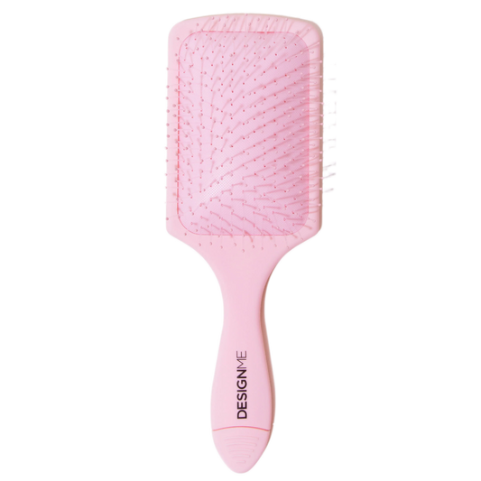 A pink paddle hairbrush with a matching pink handle, featuring the brand name 'DESIGNSE' printed vertically on the handle, set against a plain white background.