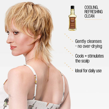 Woman with styled hair and bottle of hair product on a white background