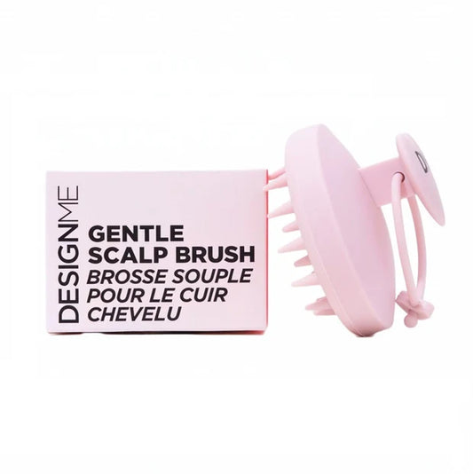 Pink scalp brush with packaging labeled 'Gentle Scalp Brush' on a white background
