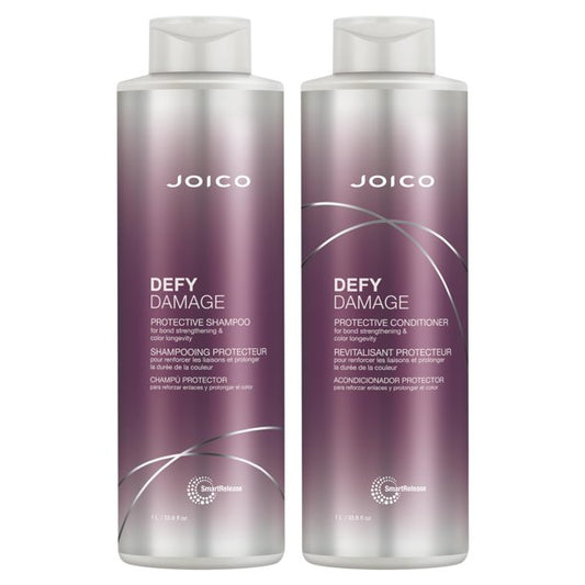 Two Joico Defy Damage shampoo and conditioner bottles on a white background