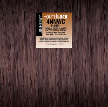 A hair color swatch card labeled 'YOUTH-LOCK 4NNWC' centered over a dark brown wood-grain background. The card shows the shade name 'Natural Warm Copper Medium Brown' and shade number '(4.