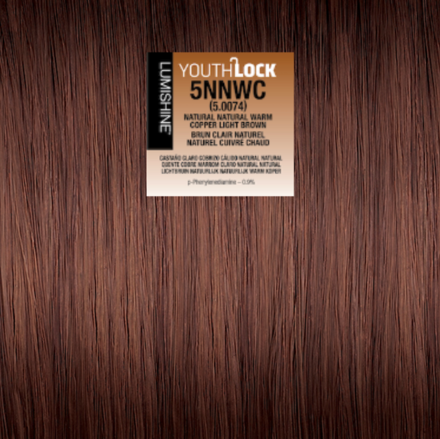 A hair color swatch card labeled 'YOUTH-LOCK 5NNWC' placed on a background of dark brown hair texture. The card details the shade as 'Natural, Natural Warm Copper Light Brown' and lists the brand 'LUMSHINE'.