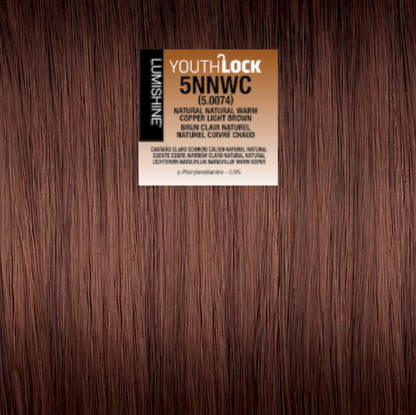 A hair color swatch card labeled 'YOUTH-LOCK 5NNWC' placed on a background of dark brown hair texture. The card details the shade as 'Natural, Natural Warm Copper Light Brown' and lists the brand 'LUMSHINE'.