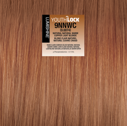 A close-up of a hair color swatch showing warm light brown to coppery blonde strands, with a Youth Lock 9NNWC label centered on the image.