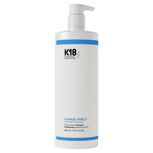 K18 Damage Shield shampoo bottle on a white background