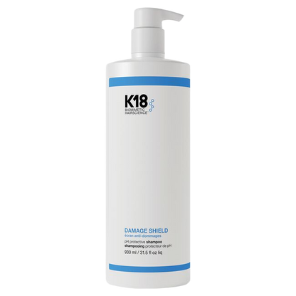 K18 Damage Shield shampoo bottle on a white background