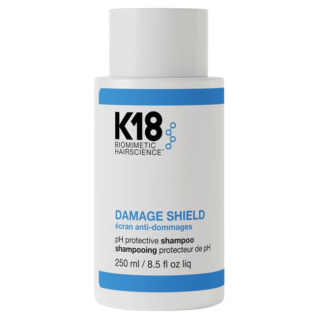 K18 Damage Shield shampoo bottle on a white background
