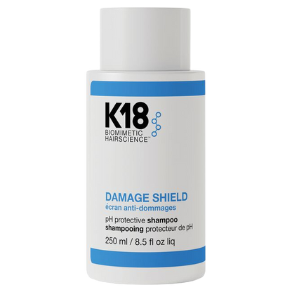 K18 Damage Shield shampoo bottle on a white background