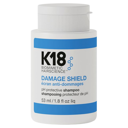 K18 Damage Shield shampoo bottle on a white background