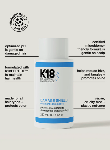K18 Damage Shield shampoo bottle with product features on a white background