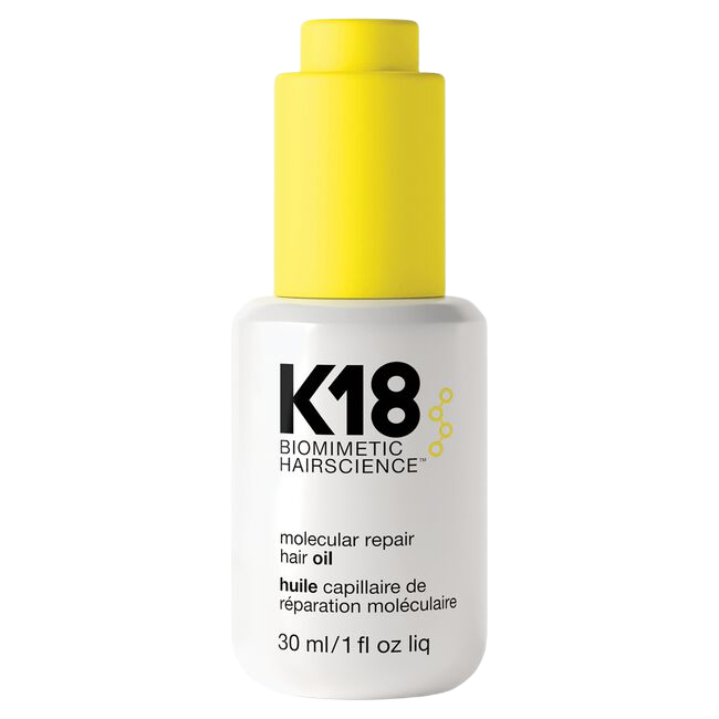 K18 biomimetic hairscience molecular repair hair oil bottle with yellow cap on a white background