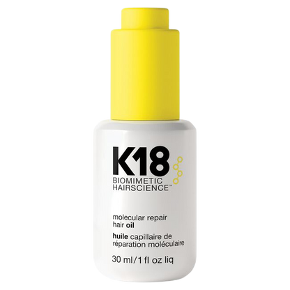 K18 biomimetic hairscience molecular repair hair oil bottle with yellow cap on a white background