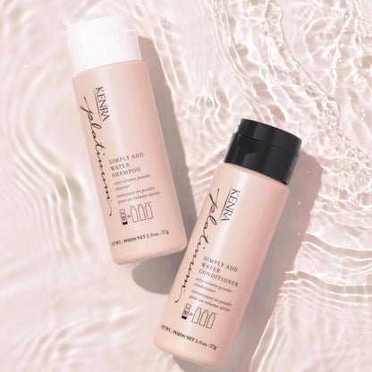 Two bottles of shampoo and conditioner on a water surface
