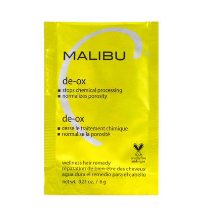 Yellow package of Malibu de-ox wellness hair remedy on a white background