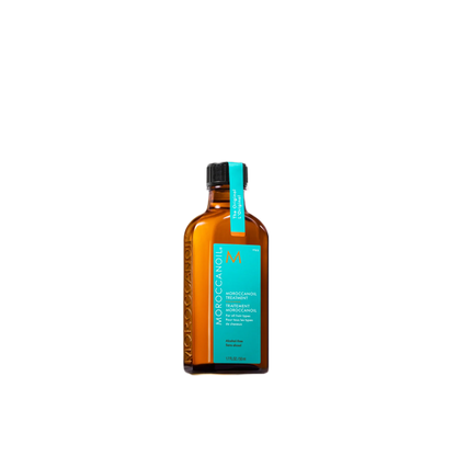 Bottle of Moroccanoil product on a white background