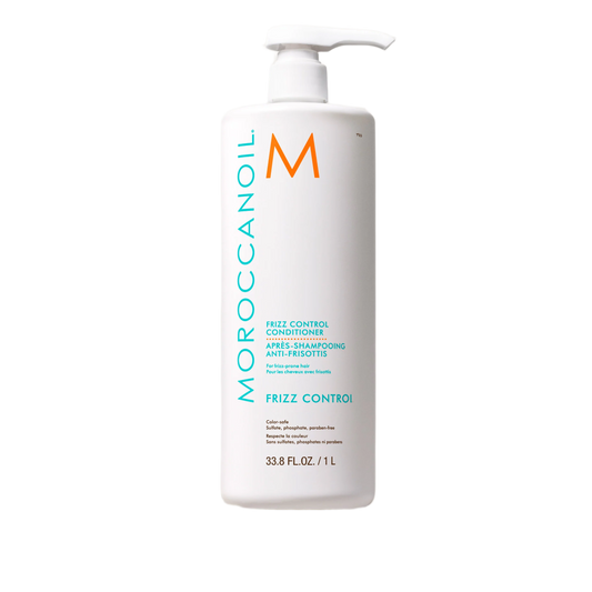 Moroccanoil frizz control product bottle on a white background
