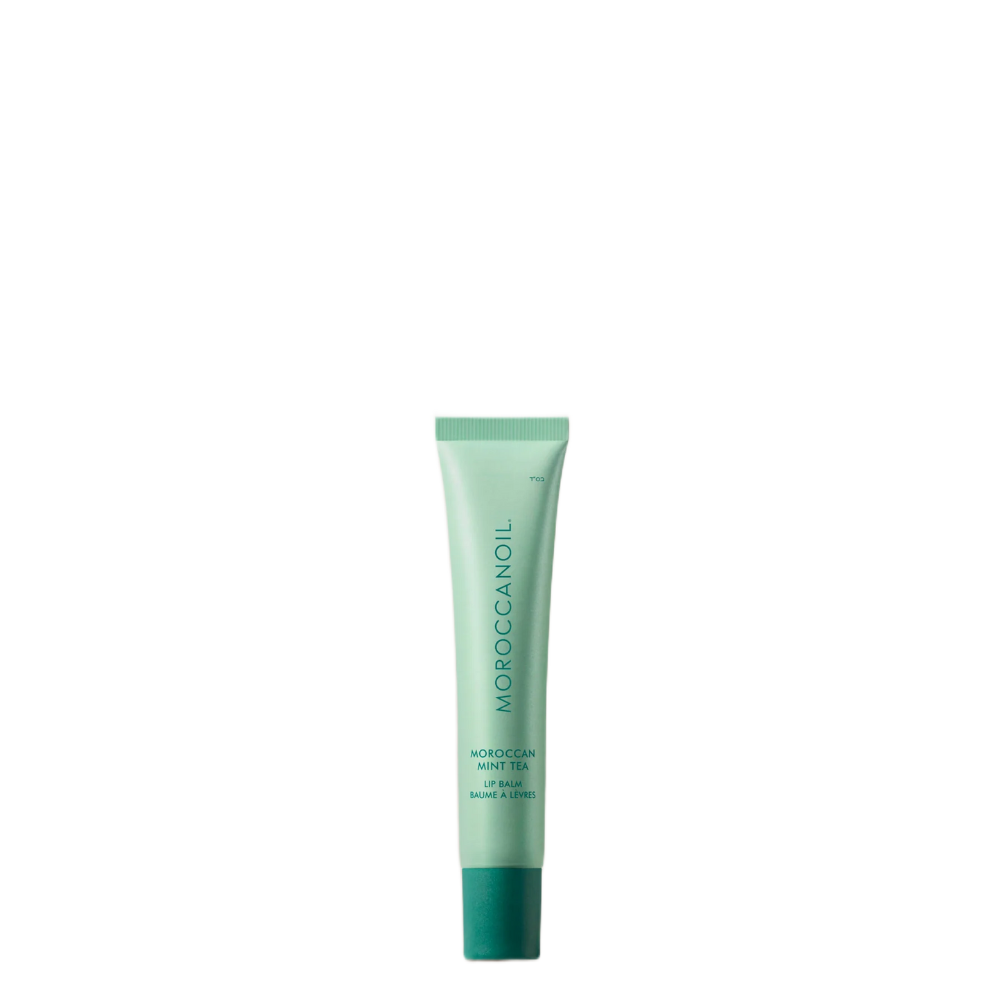 Green tube of Moroccanoil product on a white background