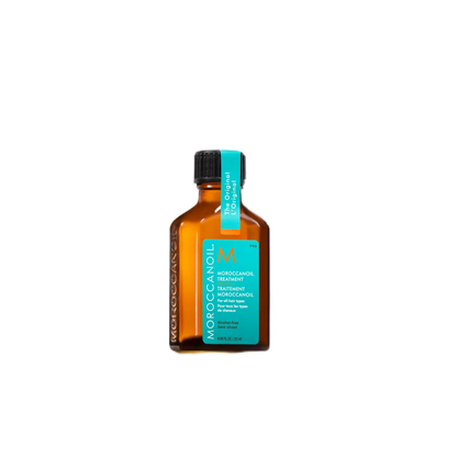 Bottle of Moroccanoil hair treatment on a white background