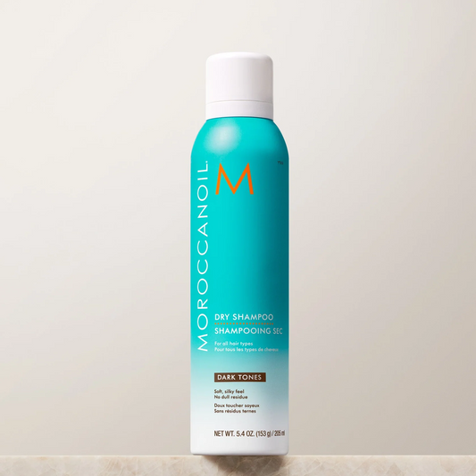 Moroccanoil dry shampoo can on a light background