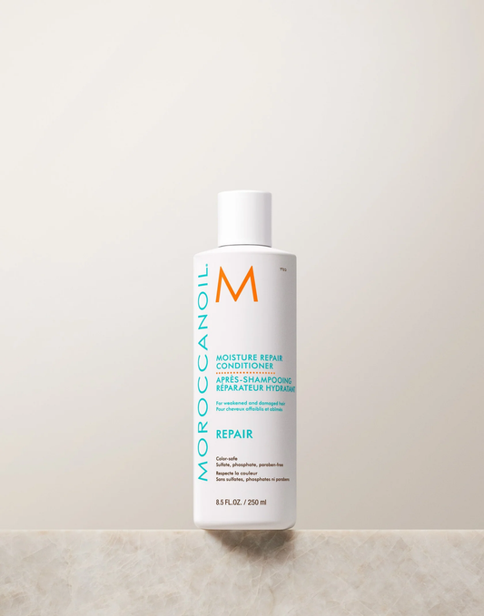Moroccanoil conditioner bottle on a light background