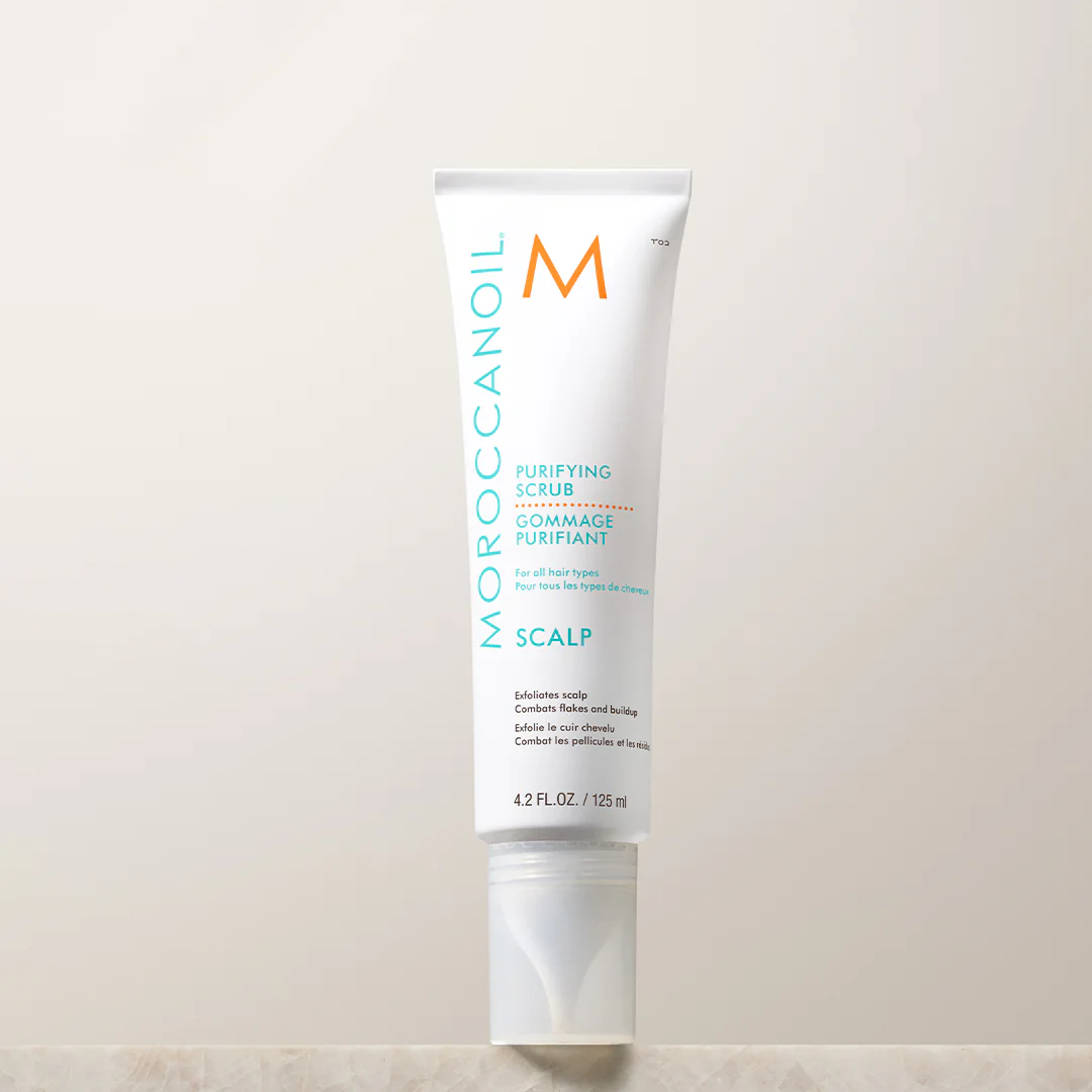 Moroccanoil scalp treatment bottle on a light background