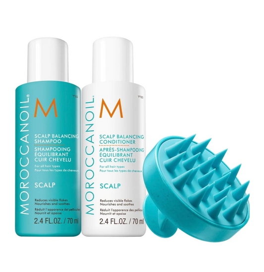 Moroccanoil scalp care product set with shampoo, conditioner, and a scalp massager on a white background.