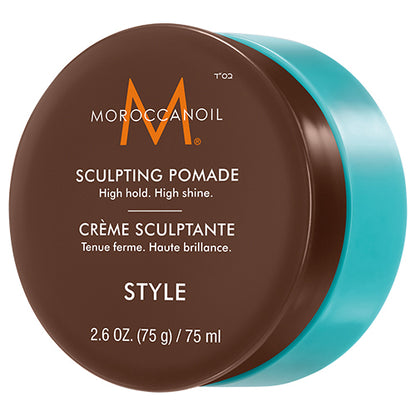 Moroccanoil sculpting pomade container with brown lid and blue sides on a white background