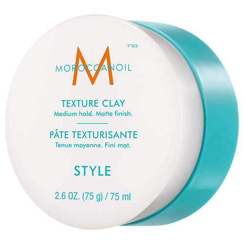 Moroccanoil Texture Clay container with white and turquoise design on a white background
