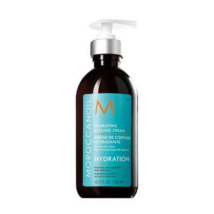 Moroccanoil Hydration Styling Cream in a 10.2 fl. oz. (300 ml) dark amber pump bottle with a turquoise label and silver pump.