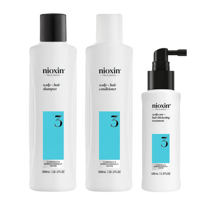 Three Nioxin hair care products on a white background