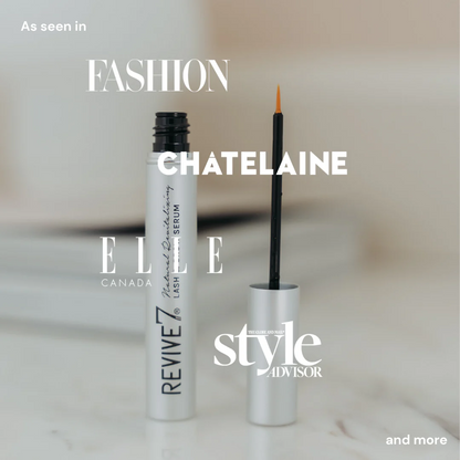 Lash serum with applicator on a marble surface, featuring multiple brand logos.