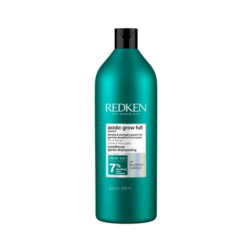 Redken bottle of acidic grow full conditioner litre product on a white background