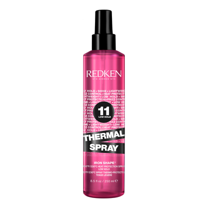 Redken Thermal Spray bottle on a white background
