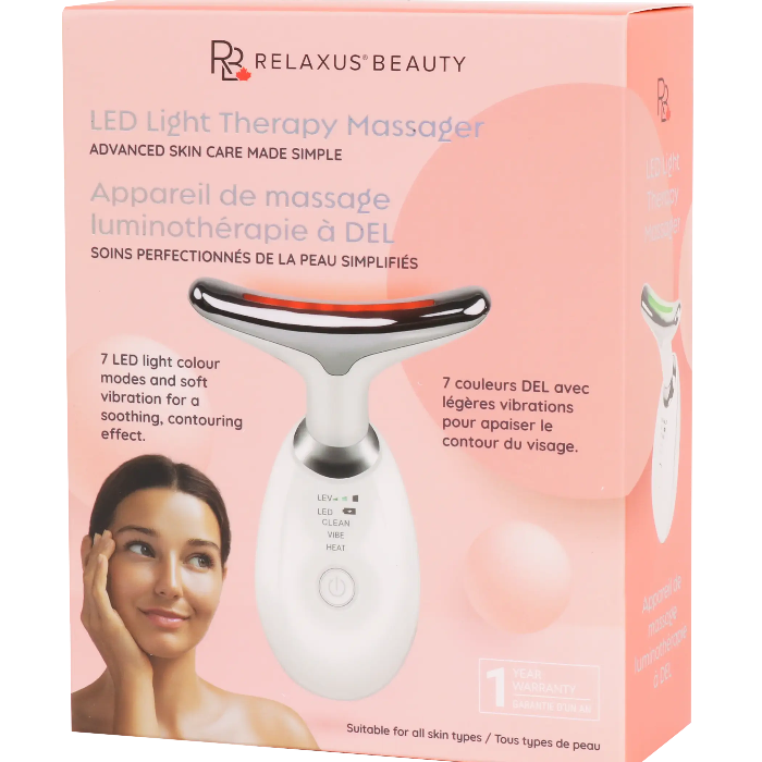 Relaxus Beauty LED Light Therapy Massager in its original pink packaging box, featuring a white and silver device with a red accent ring, shown alongside a model's face on the box front.
