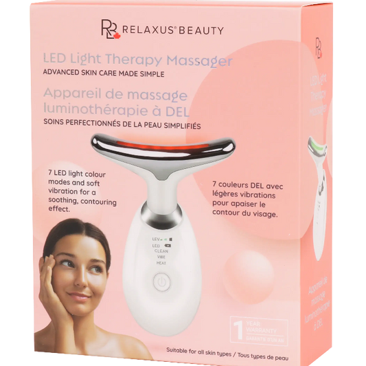 Relaxus Beauty LED Light Therapy Massager in its original pink packaging box, featuring a white and silver device with a red accent ring, shown alongside a model's face on the box front.
