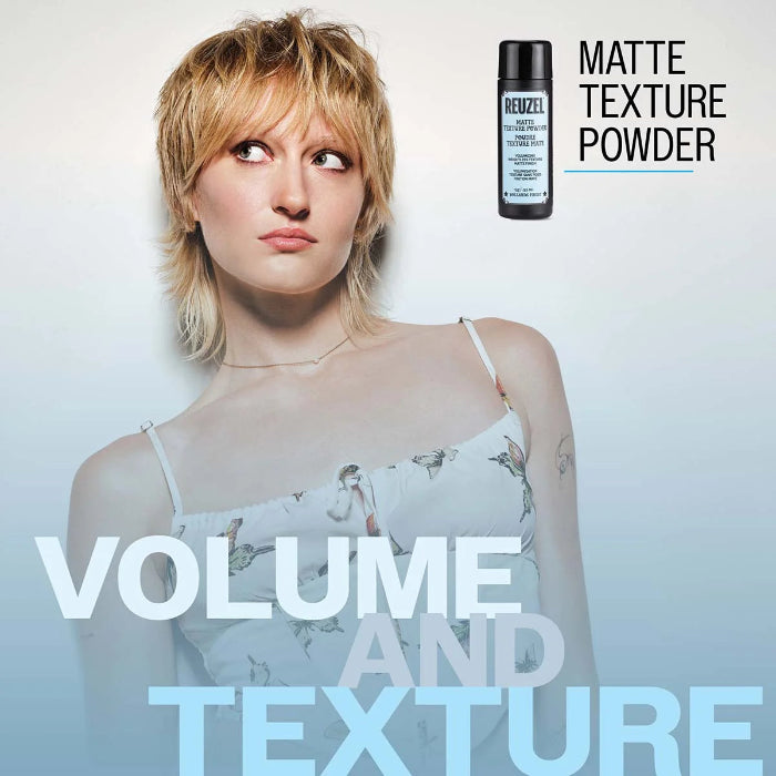 A woman with short blonde hair wearing a white spaghetti-strap dress with a bird print, posed against a light blue gradient background. In the upper right, a small bottle of HENZEL Matte Texture Powder is shown next to the text 'VOLUME AND TEXTURE'.