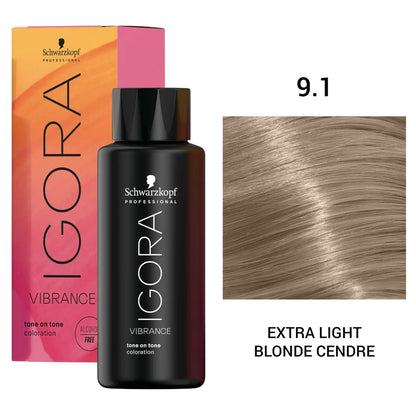 Schwarzkopf Professional Igora Vibrance tone on tone coloration bottle in shade 9.1 Extra Light Blonde Cendre, shown with its pink and orange box and a hair color swatch on a white background.