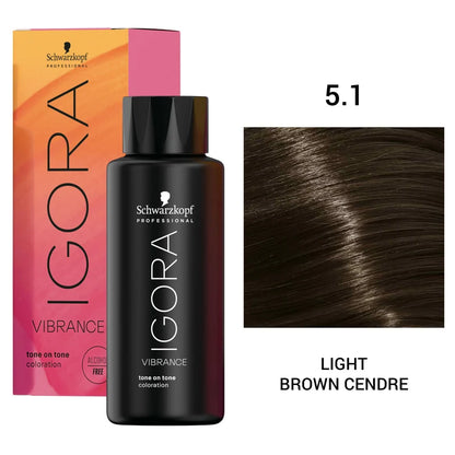 Schwarzkopf Professional Igora Vibrance tone-on-tone coloration bottle in shade 5.1 Light Brown Cendre, shown with its orange-to-pink gradient box and a hair swatch on a white background.